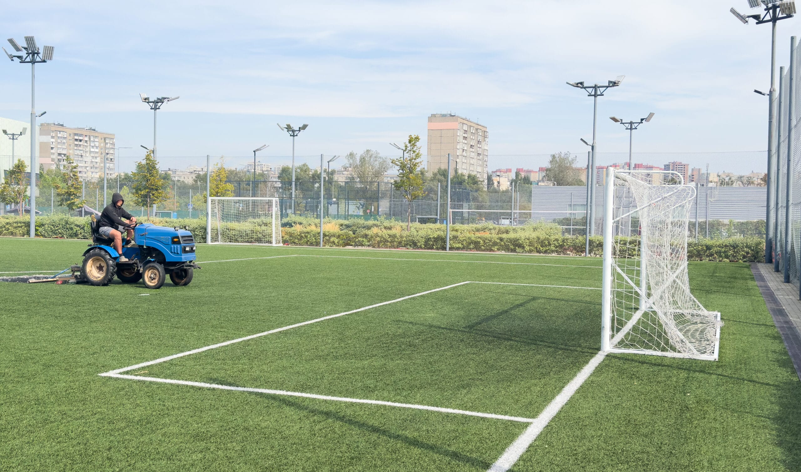 soccer field and worker in field. High quality photo